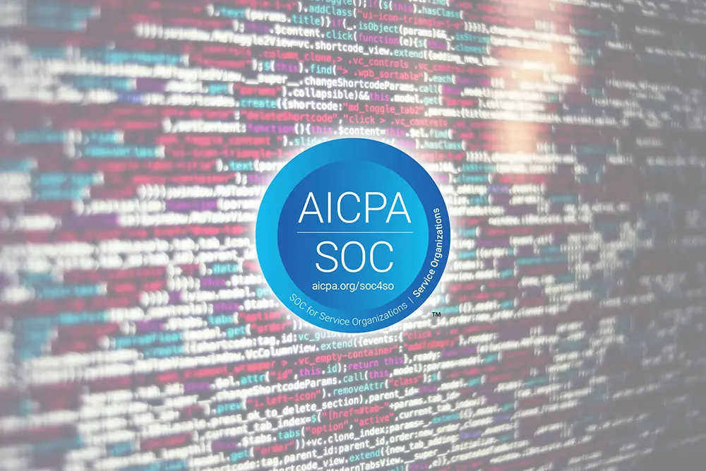 Lines of code with the AICPA SOC 2 certification logo overlay.
