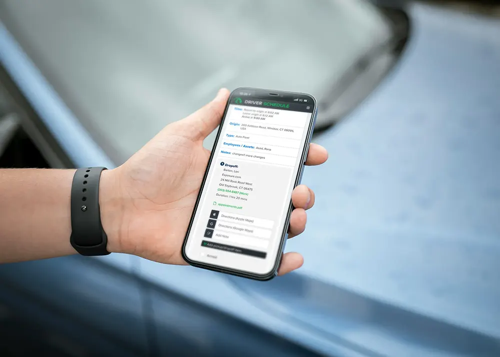 Person holding a smartphone using a custom developed app.