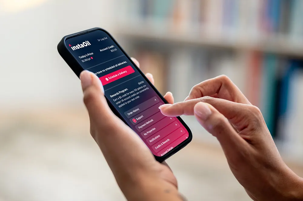 Person holding a smartphone using a mobile app.